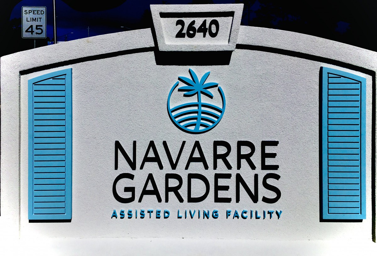 Sign for Navarre Gardens Assisted Living Facility with address number 2640.