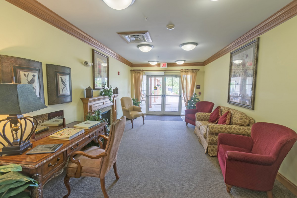 A cozy lobby area featuring comfortable seating and elegant decor.