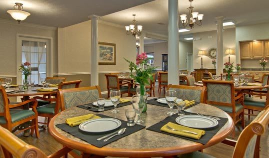 Elegantly set dining room table with a cozy, inviting ambiance.