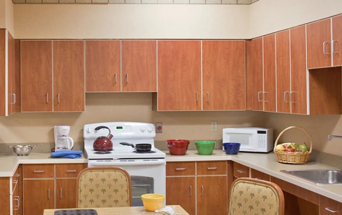 Cozy kitchen with wooden cabinets and modern appliances.