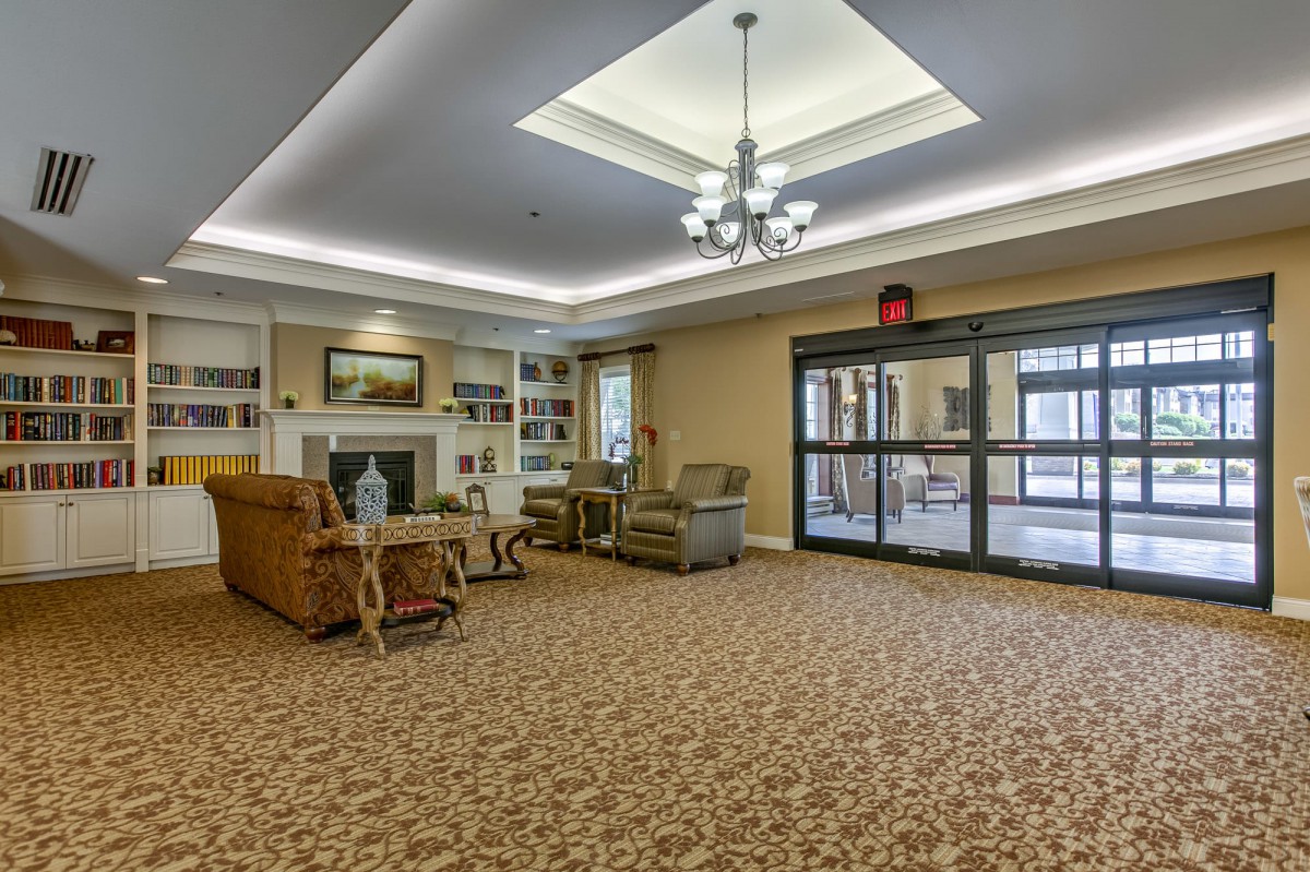 Spacious lobby with comfortable seating and elegant decor.