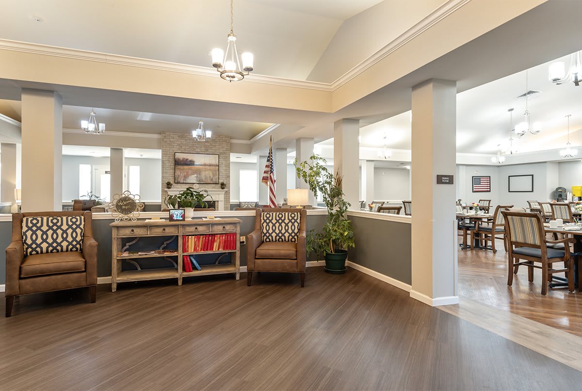 A welcoming lobby area with furniture, plants, and decorative elements.