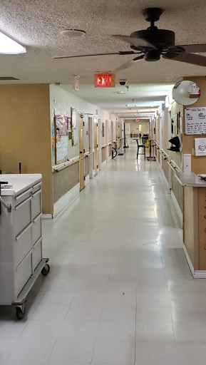 A view of a hospital hallway, showcasing the clean and organized environment typical of medical facilities.