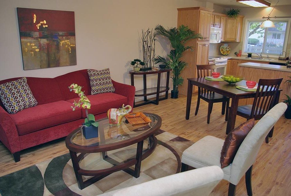 A cozy open-plan living and dining area with modern furniture.