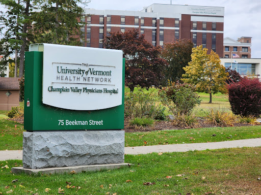 Signage for the University of Vermont Health Network at Champlain Valley Physicians Hospital.