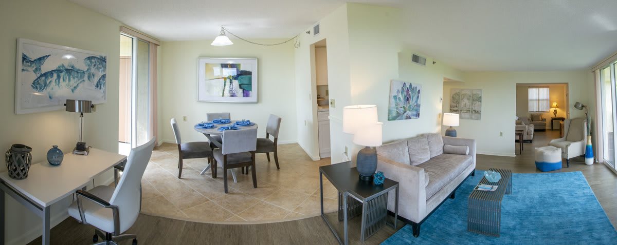 A cozy living and dining area featuring modern furniture and stylish decor.