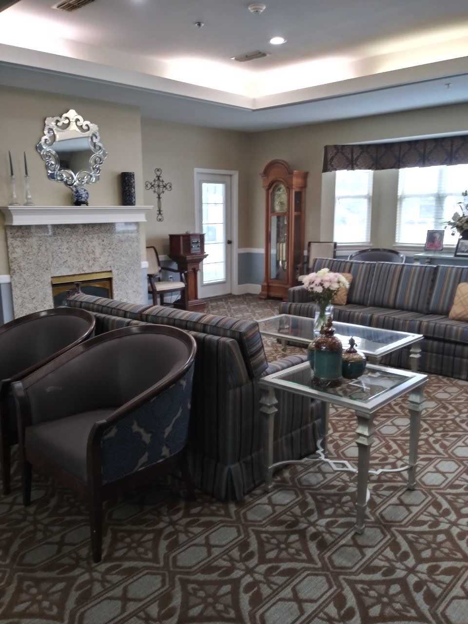 A cozy and elegant living room with classic furniture and decor.
