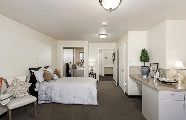 A modern and cozy bedroom with elegant interior design.