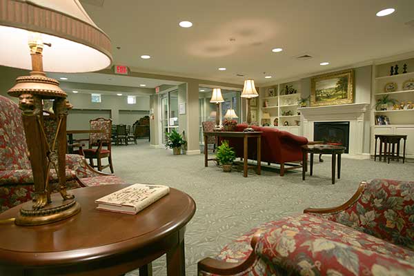 A cozy lobby with comfortable seating and warm lighting.