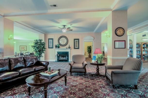 A cozy living room with plush seating and elegant decor.