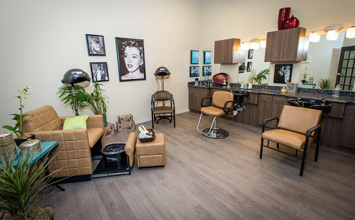 A modern and stylish hair salon with elegant decor and a welcoming atmosphere.