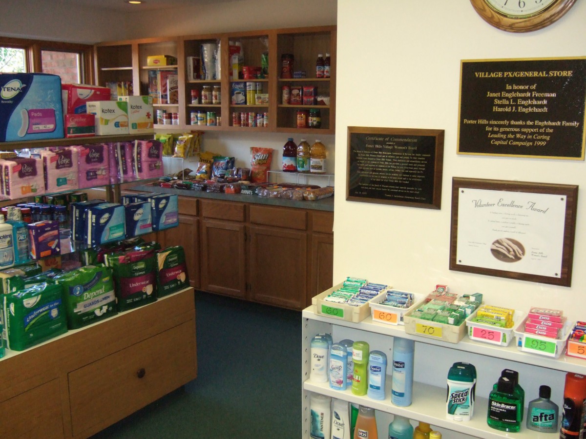Interior view of a pharmacy displaying various health products and medications on shelves.