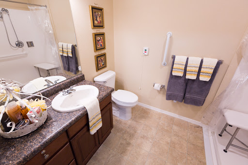 A well-organized and stylish bathroom with modern fixtures and elegant decor.