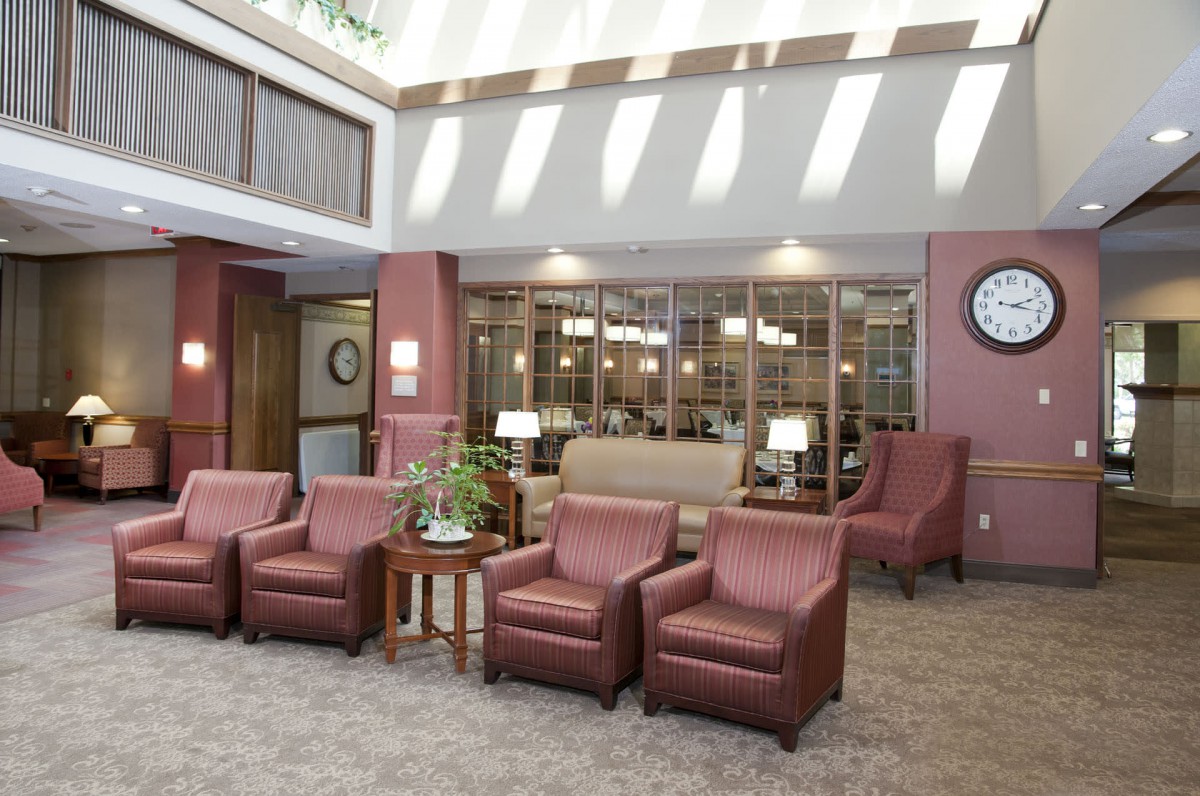 A spacious lobby with comfortable seating and natural light.