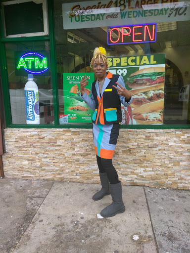 A vibrant fashion statement in front of a local store.