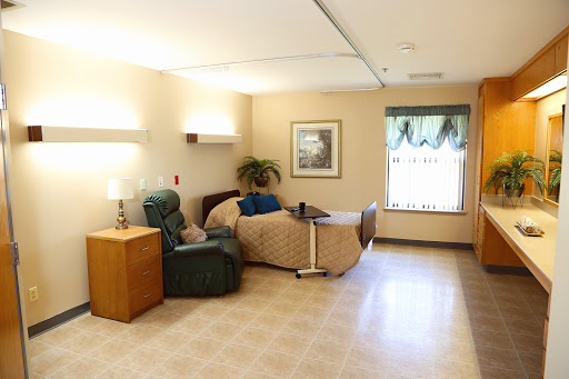 A cozy hospital room equipped for patient comfort and care.