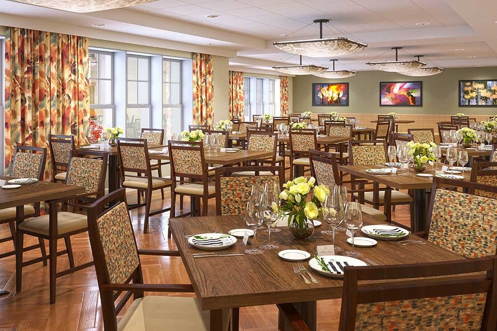 Elegant restaurant dining area with neatly set tables and chairs.
